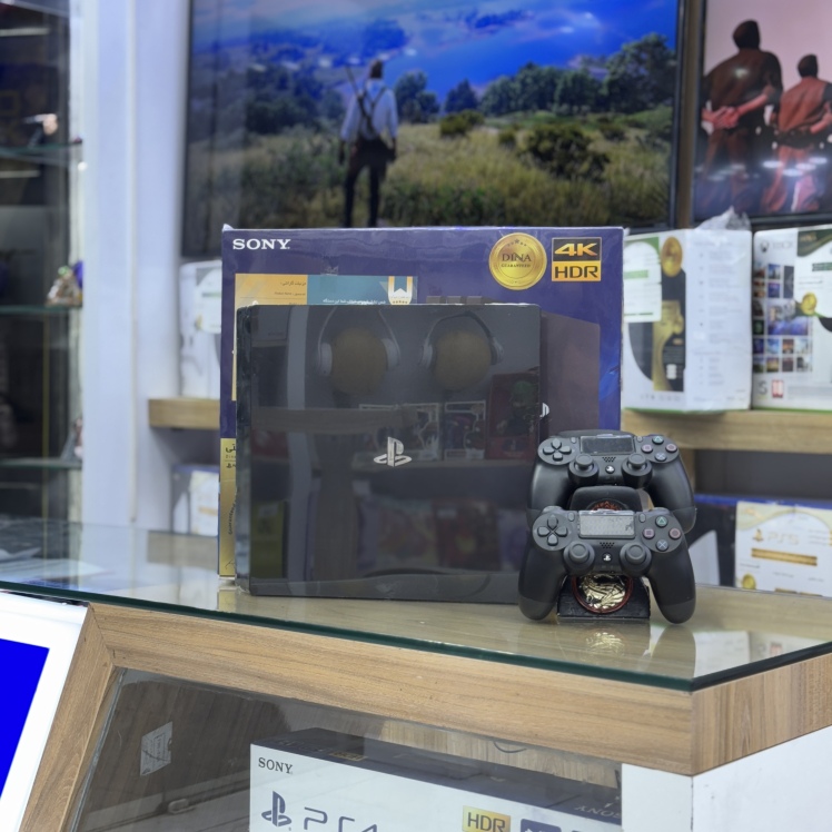 پی اس فور پرو یک ترا 12 ماه ضمانت تعویض پک بازی و دو دسته آکبند